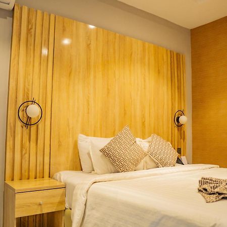 אקורה Ojaja Suites By Perennia מראה חיצוני תמונה
