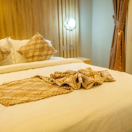 אקורה Ojaja Suites By Perennia מראה חיצוני תמונה