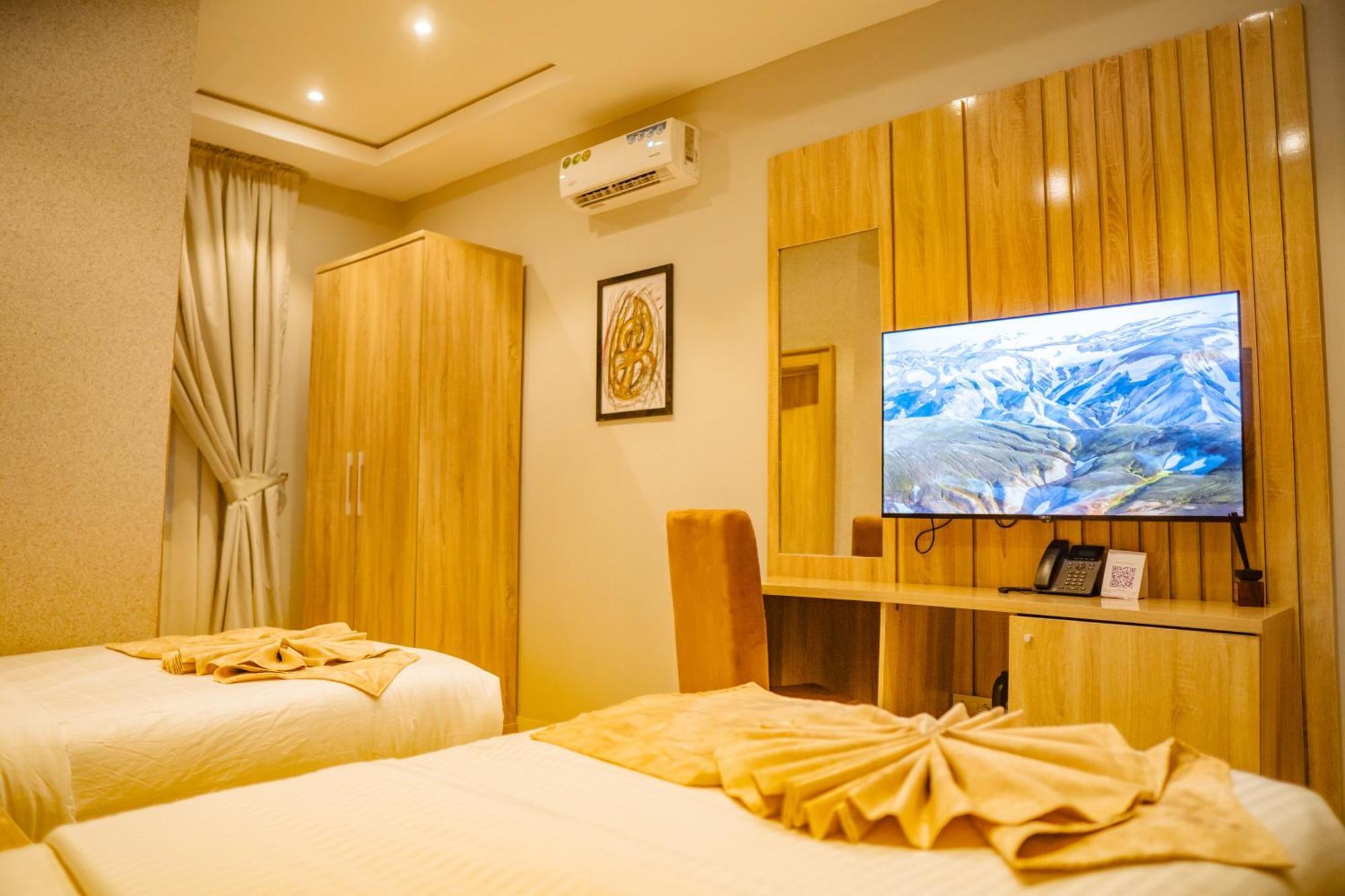 אקורה Ojaja Suites By Perennia מראה חיצוני תמונה