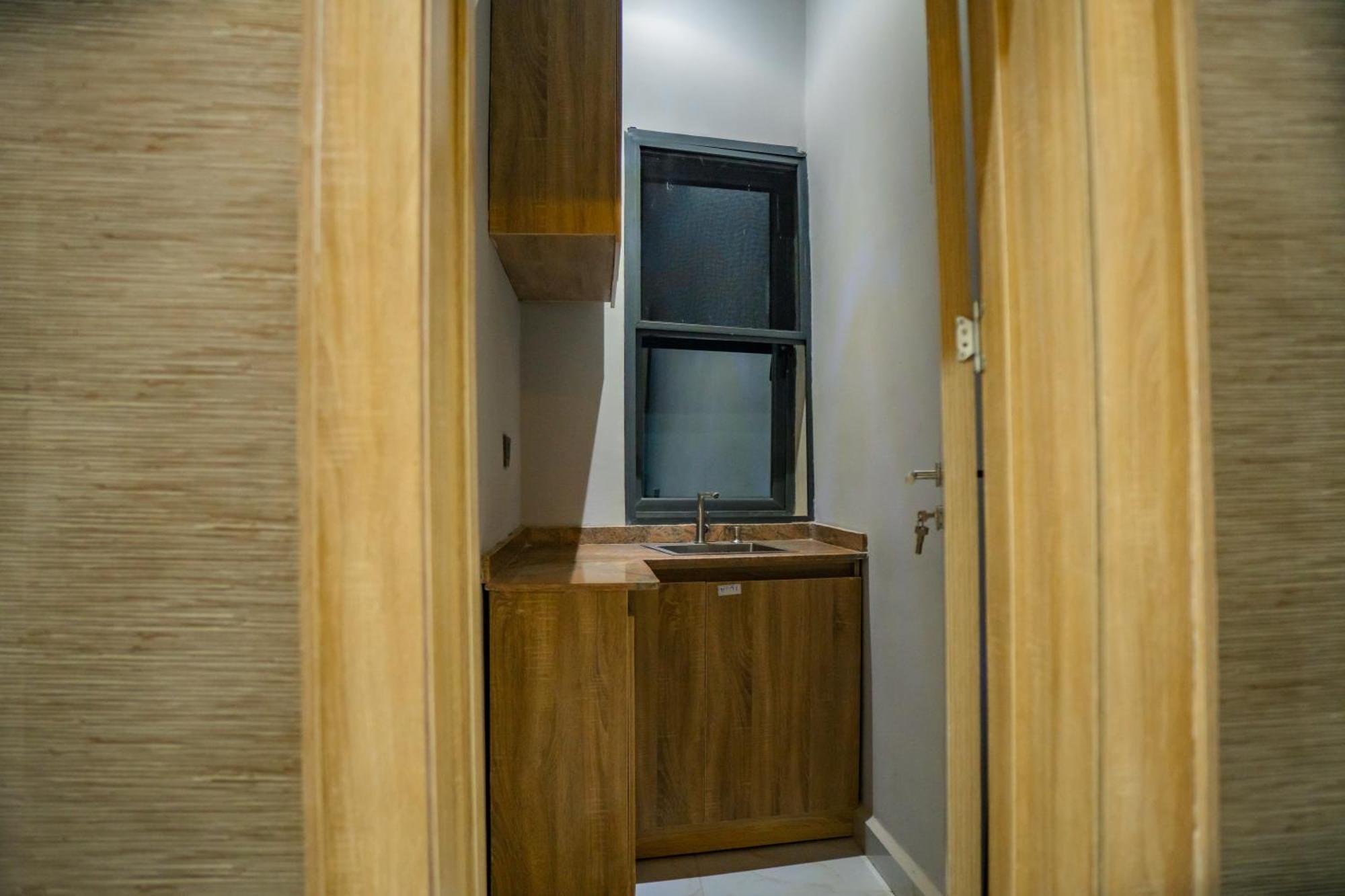 אקורה Ojaja Suites By Perennia מראה חיצוני תמונה