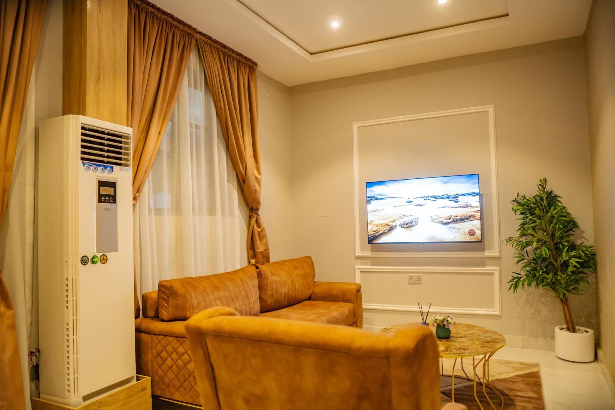 אקורה Ojaja Suites By Perennia מראה חיצוני תמונה